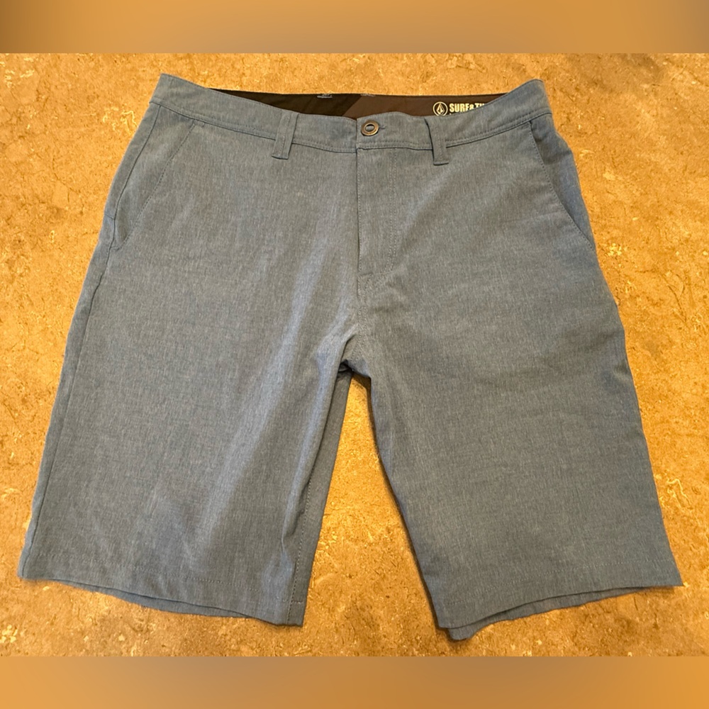 New never worn, Volcom shorts. Size 34, 20”. Stretchy and lightweight.